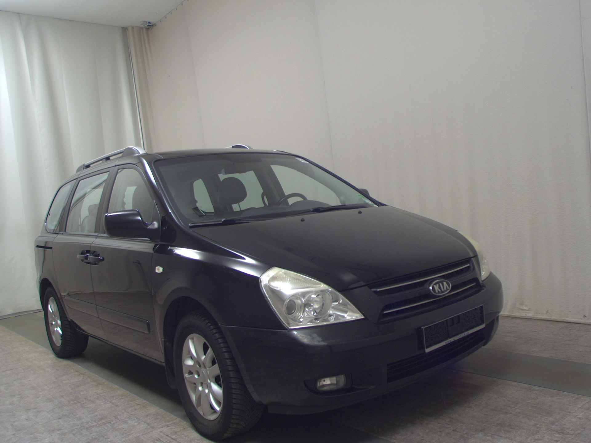 Kia Carnival 2.7 V6 Leder 7-Sitzer PDC HU 05/27 3